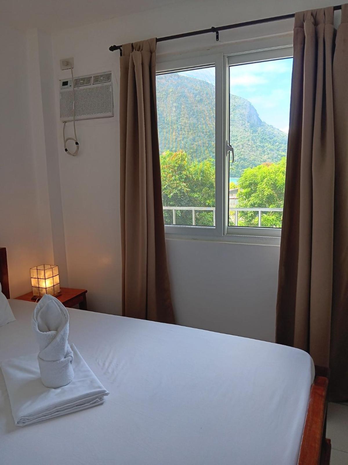 Forest Bay Inn Эль-Нидо Экстерьер фото